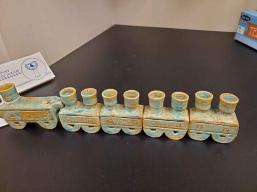 Kids train menorah with built in whistle handmade by local potter