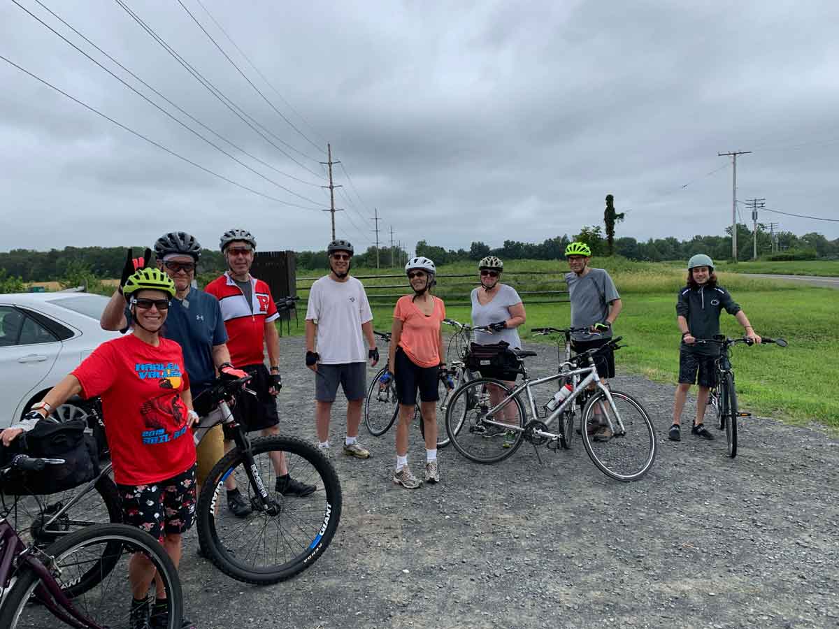 People Standing by Bikes